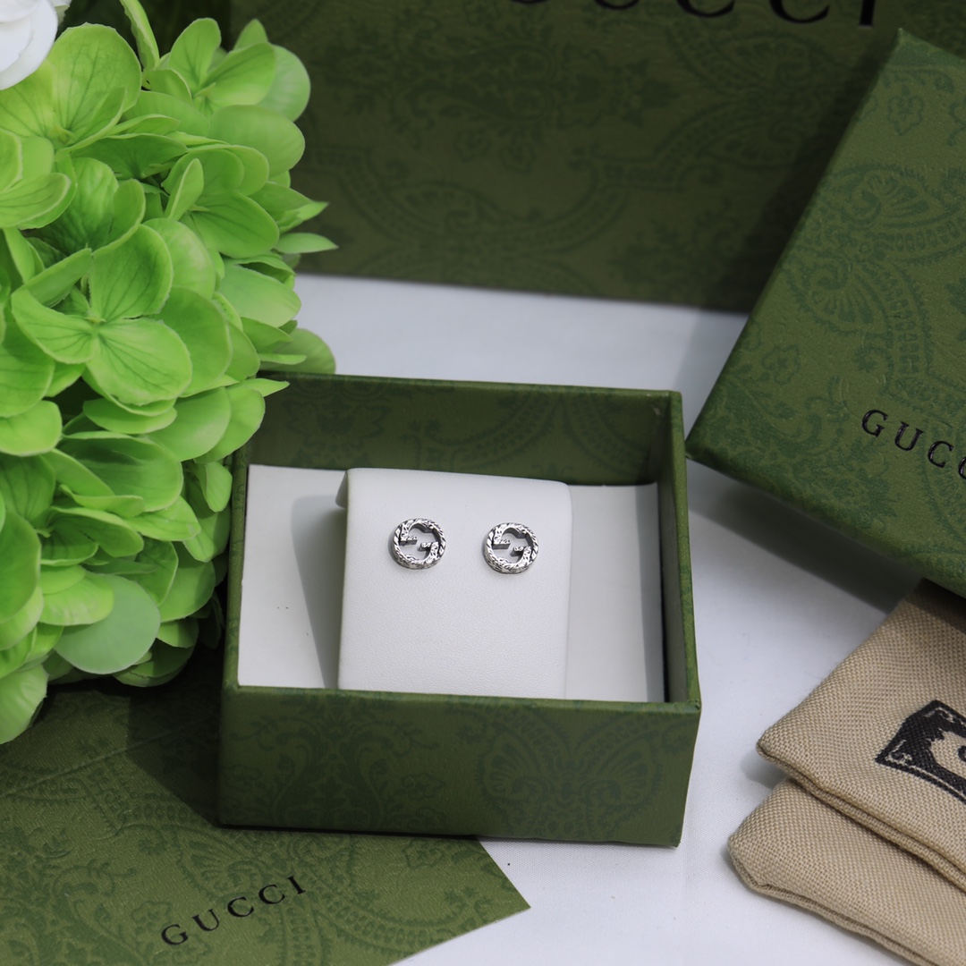 Gucci Interlocking G earrings In Silver - EUR FASHION