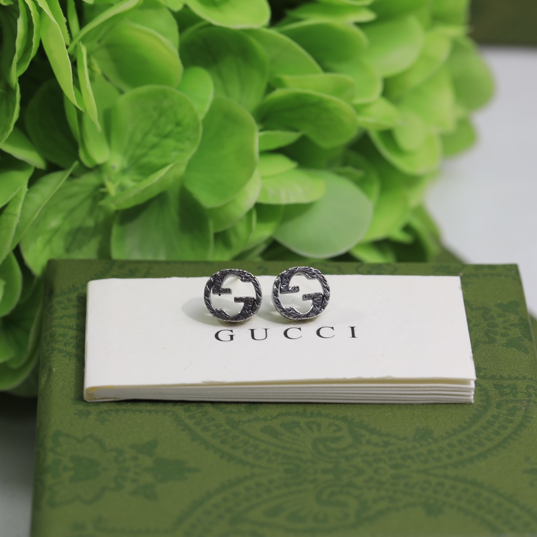 Gucci Interlocking G earrings In Silver - EUR FASHION