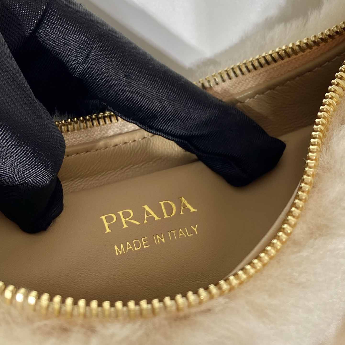 Prada Arqué Shearling And Leather Shoulder Bag - EUR FASHION