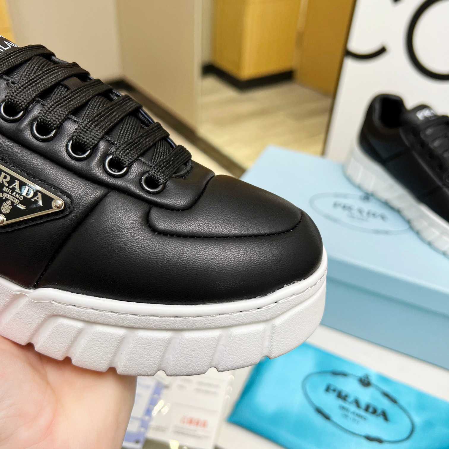 Prada Padded Nappa Leather Sneakers - EUR FASHION