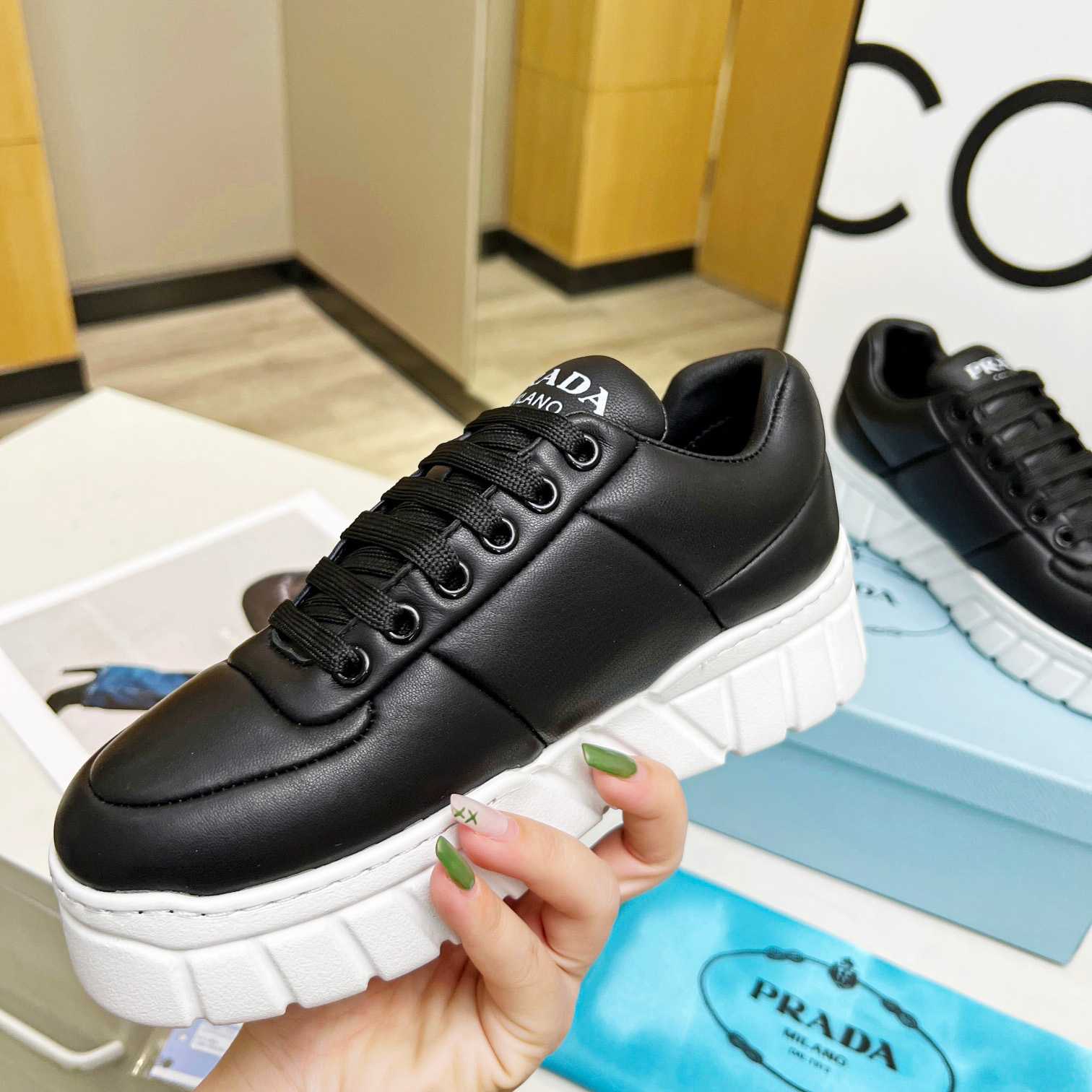Prada Padded Nappa Leather Sneakers - EUR FASHION