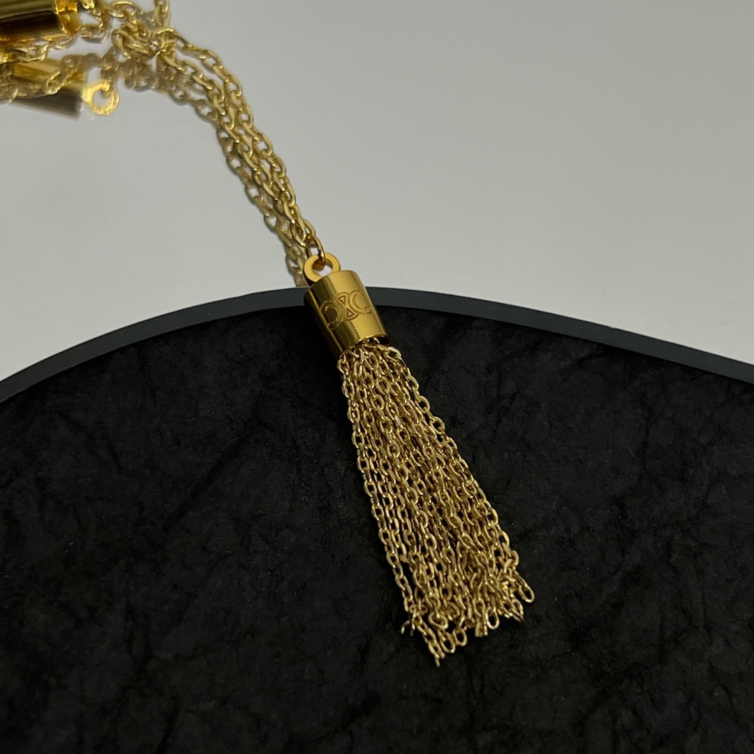 Celine Triomphe Folk Pompons Sautoir In Brass With Gold Finish - EUR FASHION