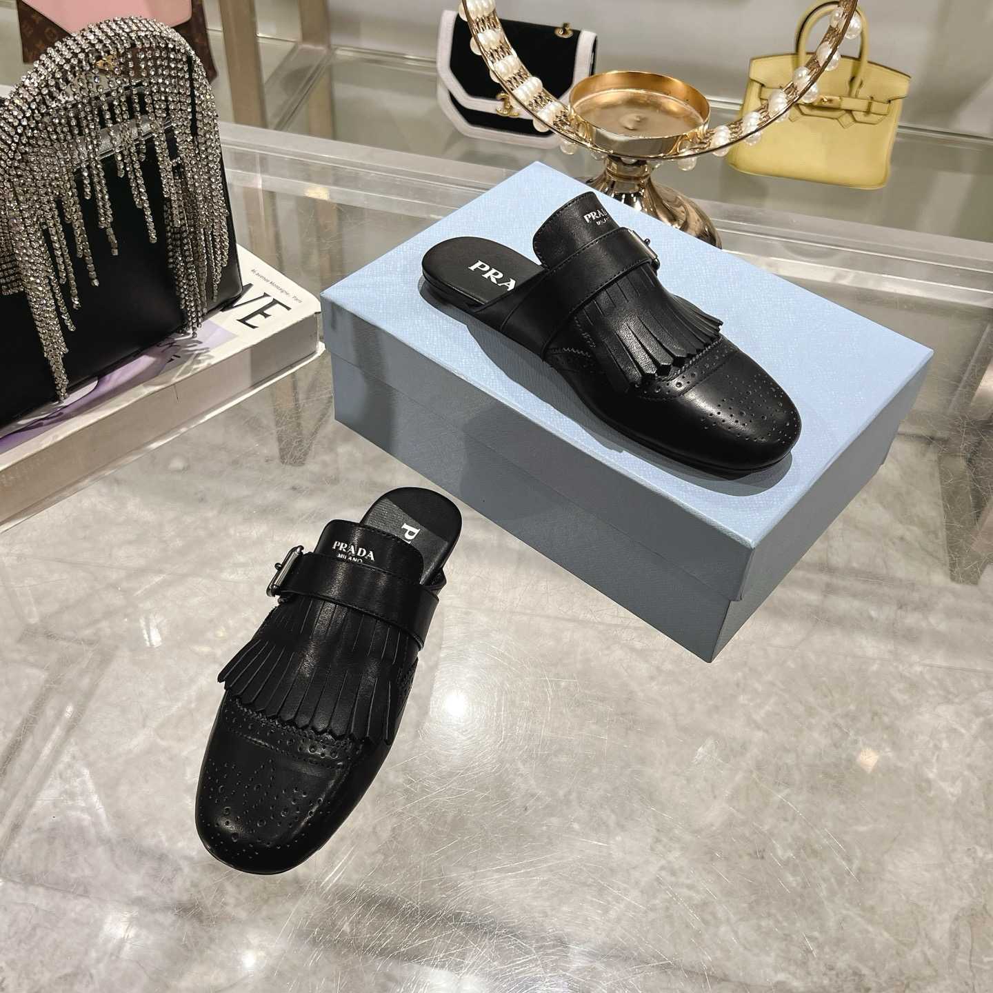 Prada Shuffle Fringed Monk Strap Leather Mules - EUR FASHION
