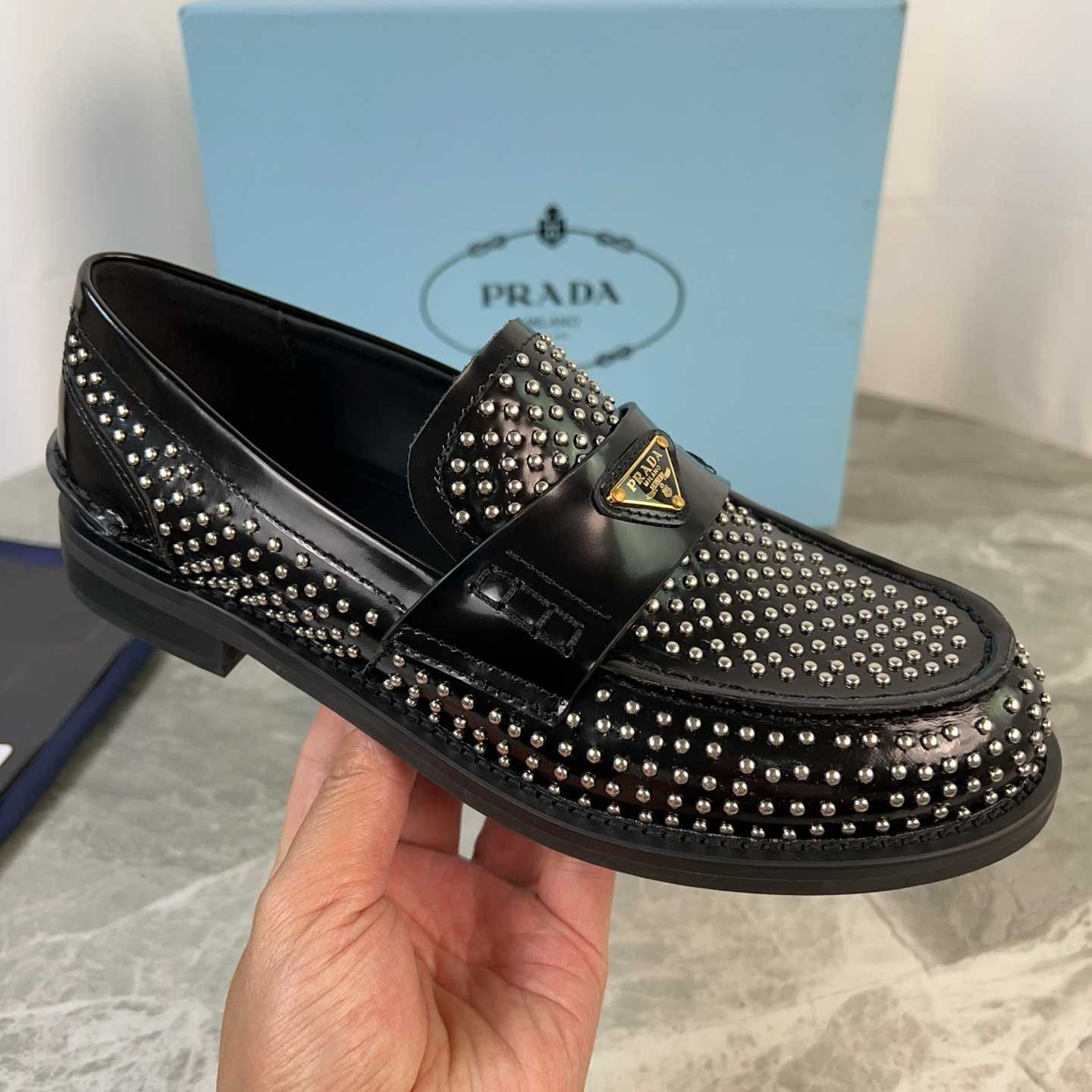 Prada Studded Brushed Leather Loafers - EUR FASHION
