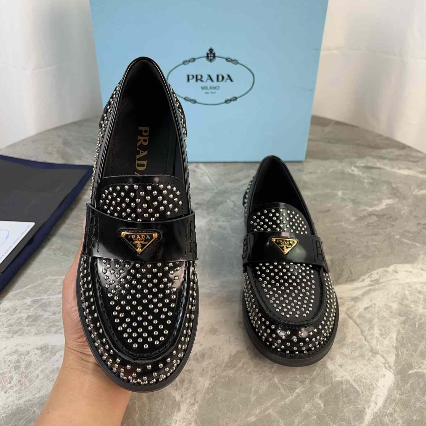 Prada Studded Brushed Leather Loafers - EUR FASHION