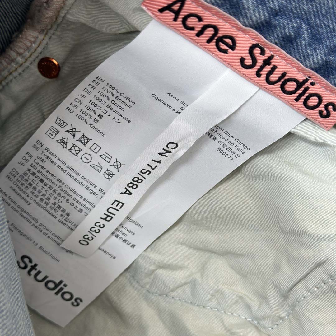 Acne Studios Mud-dyed torn jeans - EUR FASHION