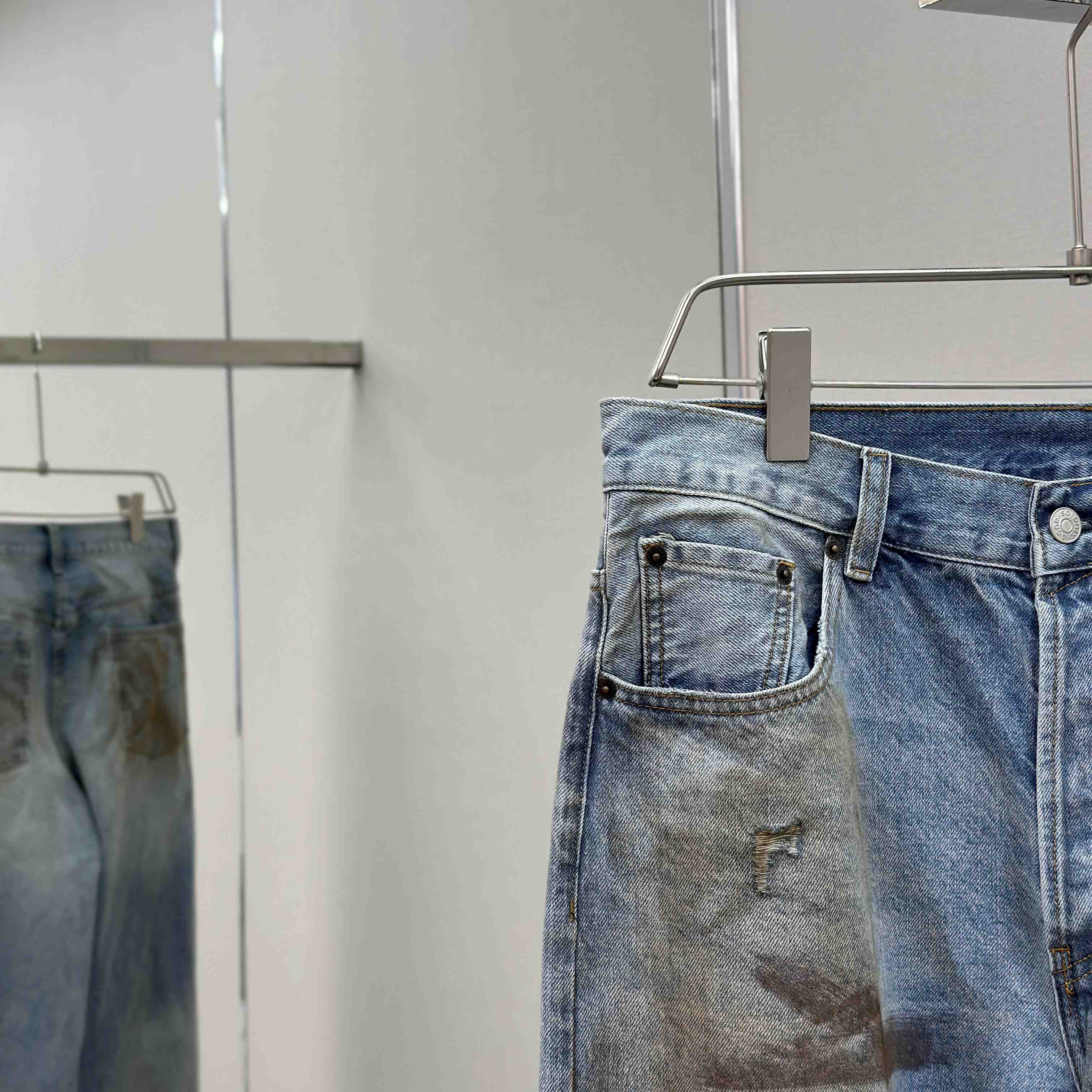 Acne Studios Mud-dyed torn jeans - EUR FASHION