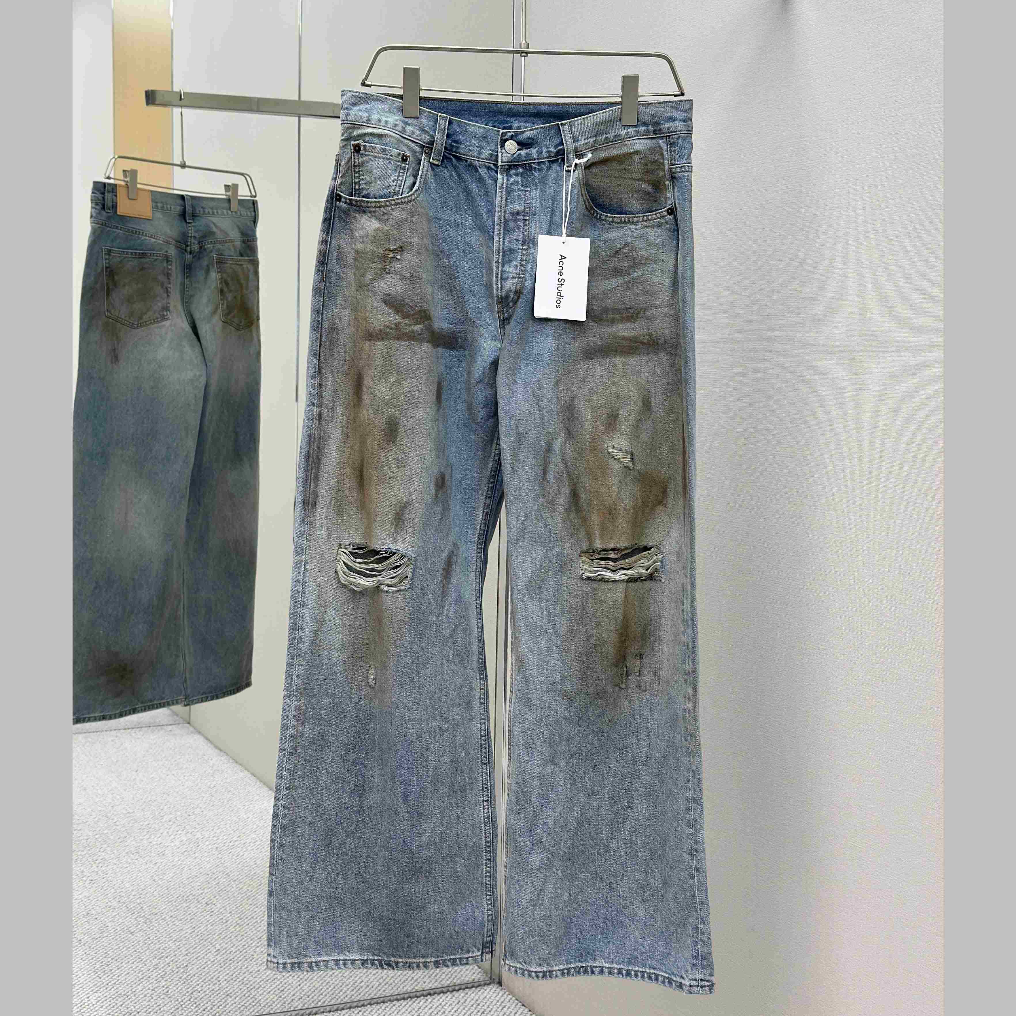 Acne Studios Mud-dyed torn jeans - EUR FASHION